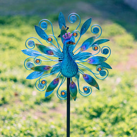 Stargarden metal wind spinner features rust-resistant construction for long-lasting outdoor appeal.