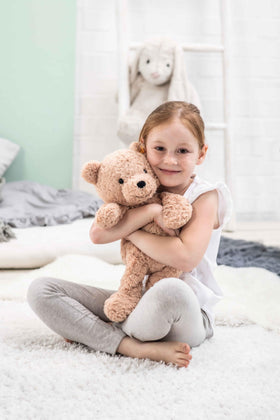 Steiff Jimmy Teddy Bear encourages imaginative play with a floppy, friendly pose.
