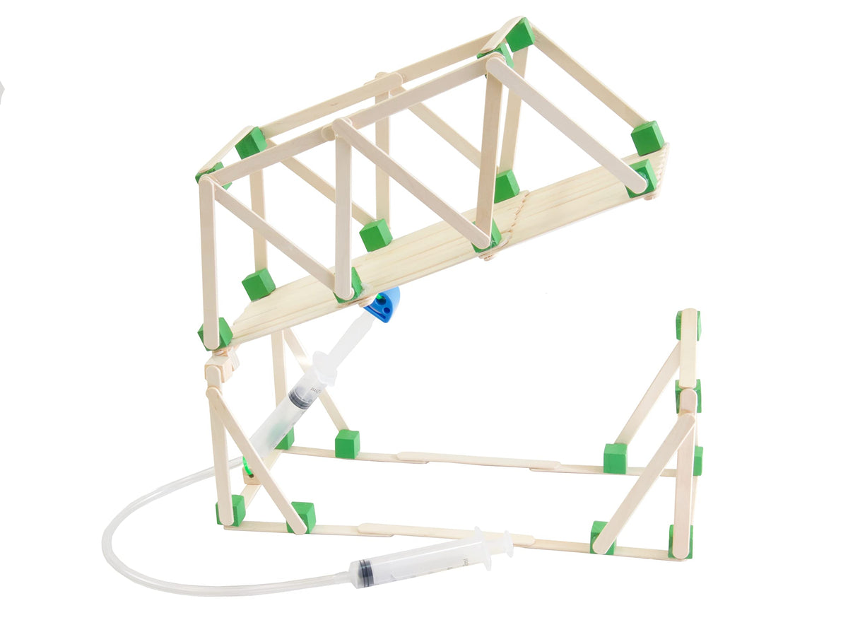 STEM Inventions robotic arm model uses syringes and tubing to simulate motion.