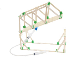 STEM Inventions robotic arm model uses syringes and tubing to simulate motion.