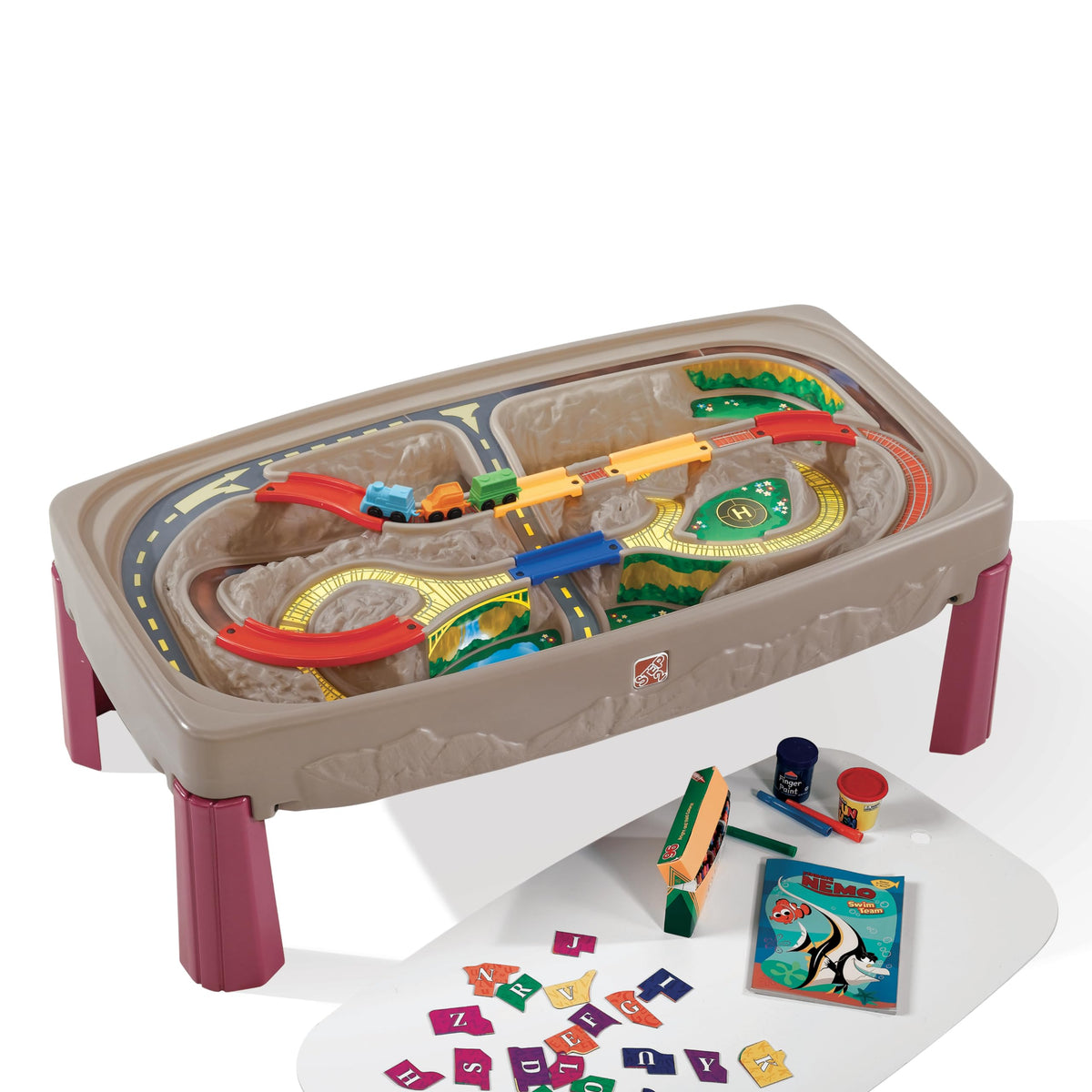 Step2 Deluxe built-in bridges over tracks for immersive play.