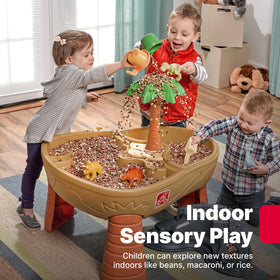 Step2 Dino Dig scoops for digging and pouring during sensory play.