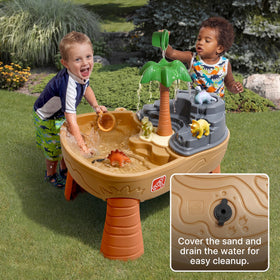 Step2 Dino Dig palm tree and dinosaurs boost imaginative outdoor play.