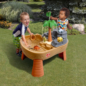Step2 Dino Dig two-compartment design supports simultaneous sand and water fun.