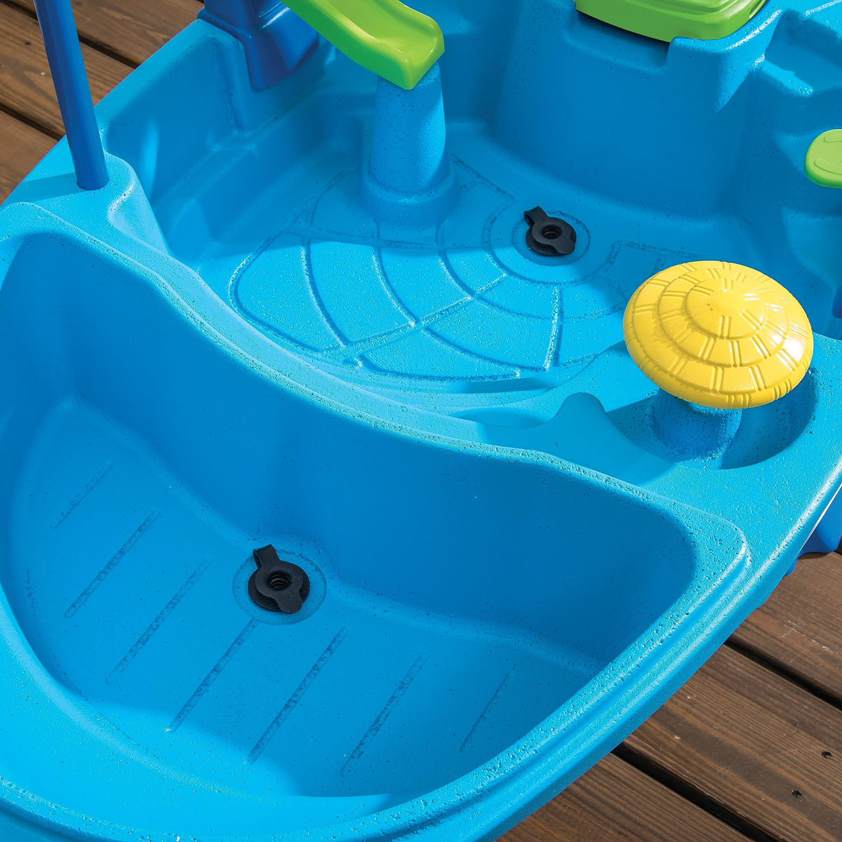 Cruise ship lid demonstrated for toy storage after play
