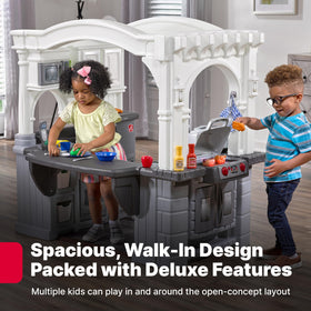 Step2 Grand Walk-In Kitchen and Grill stove with lights and sounds sparks imaginative cooking.