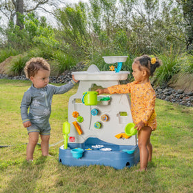 Step2 garden hose attachment activates misting feature for cooling water play.