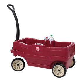 Step2 Neighborhood Wagon red exterior offers a cozy ride for two kids on family outings.