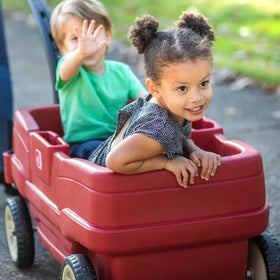 Step2 Neighborhood Wagon side storage keeps snacks and toys within easy reach.