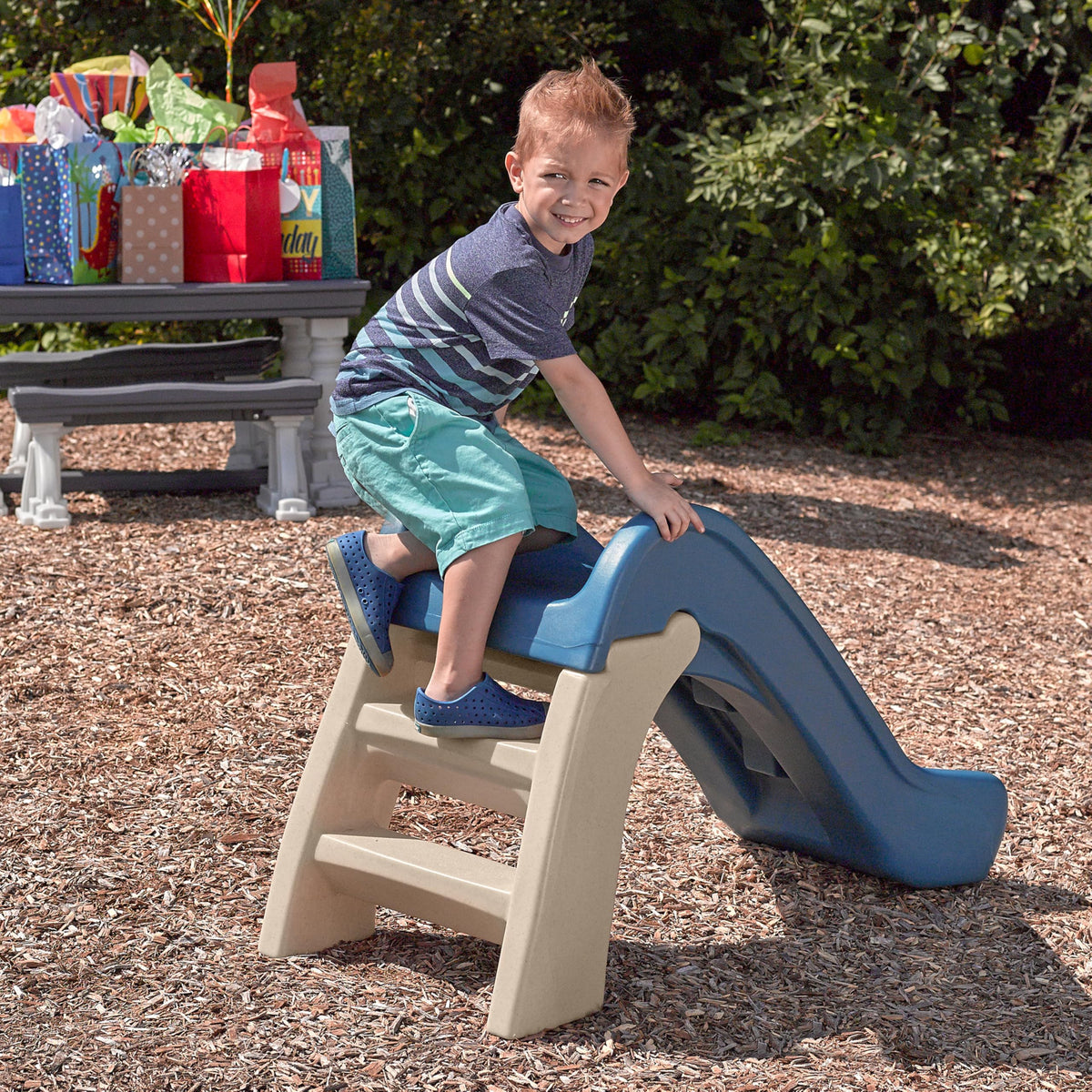 Step2 Play & Fold Jr Slide children at play demonstrates active backyard fun