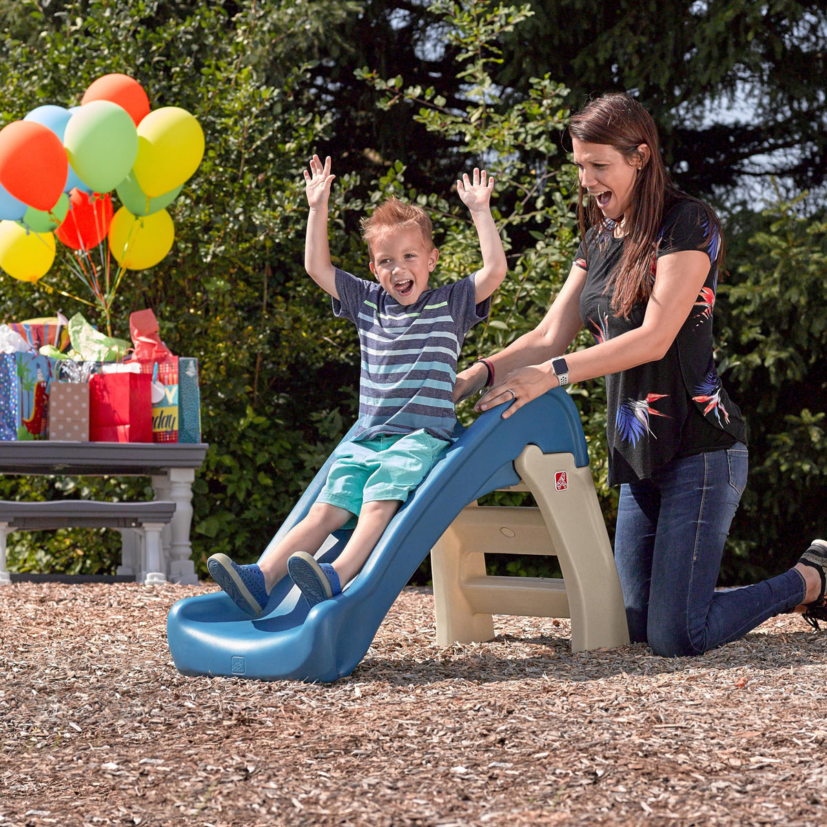 Step2 Play & Fold Jr Slide indoor playroom setup supports rainy day fun