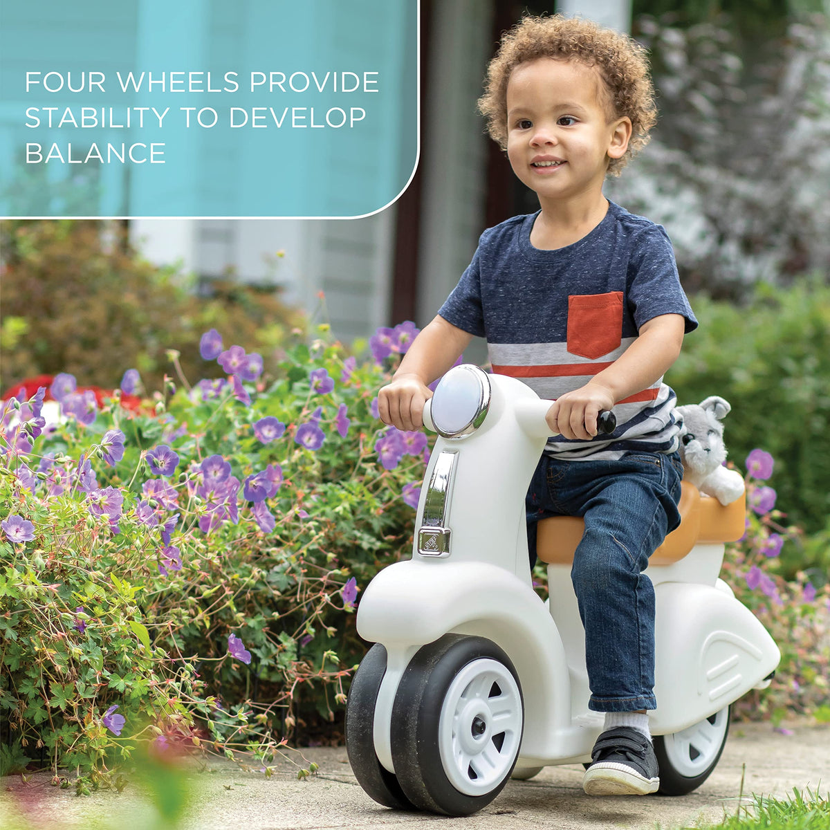 Step2 Ride Along scooter white wheels close-up, durable plastic design.