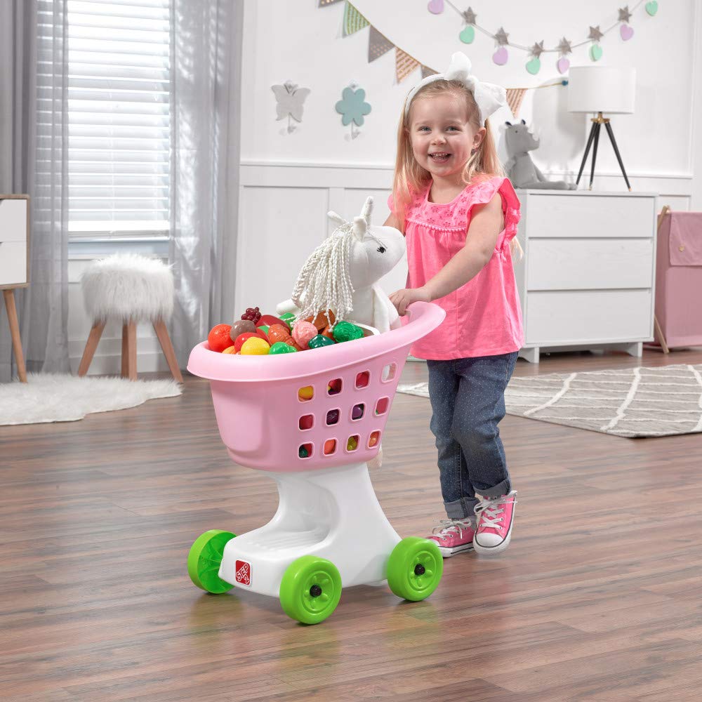 Step2 cart with easy-grip handles supports safe pushing during play.