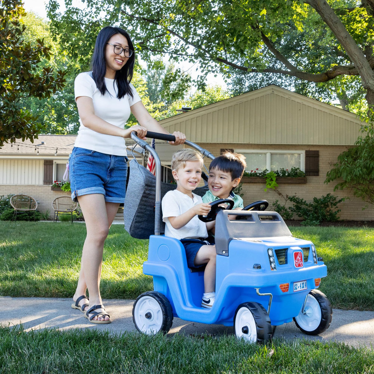 Step2 Side-by-Side Push Around SUV adjustable canopy provides sun shade for both riders