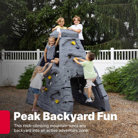 Step2 Skyward Summit four-sided wall in a backyard setting inviting imaginative outdoor play.