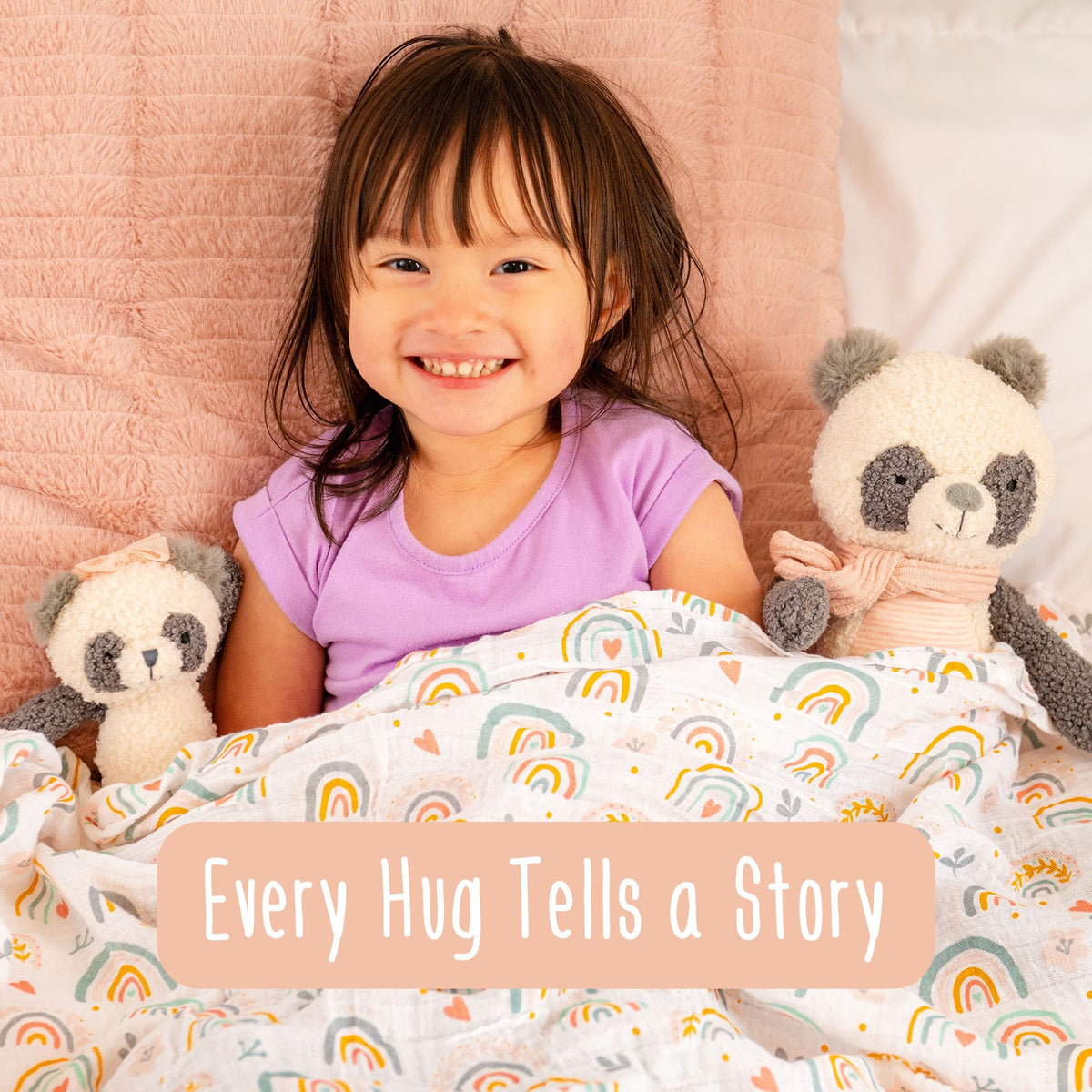 Stephen Joseph Bella Bunny plush with child demonstrating cuddly play