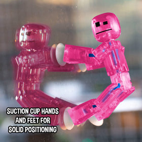 StikBot Zing suction cups grip flat surfaces for flexible angles.