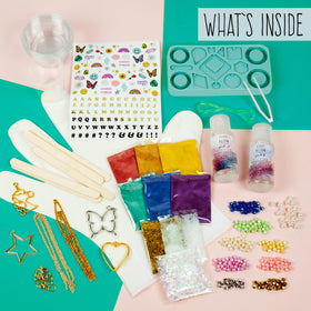STMT D.I.Y. resin jewelry pouring setup showing easy resin mixing and clean pours