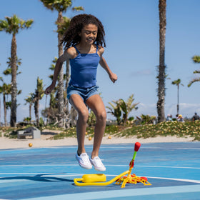 Kids enjoy safe, momentum-based outdoor play with friends.