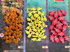 Stonemaier Finspan 50 squishy eggs sit securely on the board.