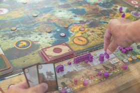 Stonemaier Games' Scythe expansion features on-board artwork and thematic detail.