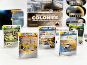Stronghold Games' The Colonies product image conveys a rich, strategic space conquest vibe