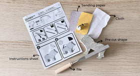 STUDIOSTONE CREATIVE rasp and sandpaper tools help shape and smooth the sculpture