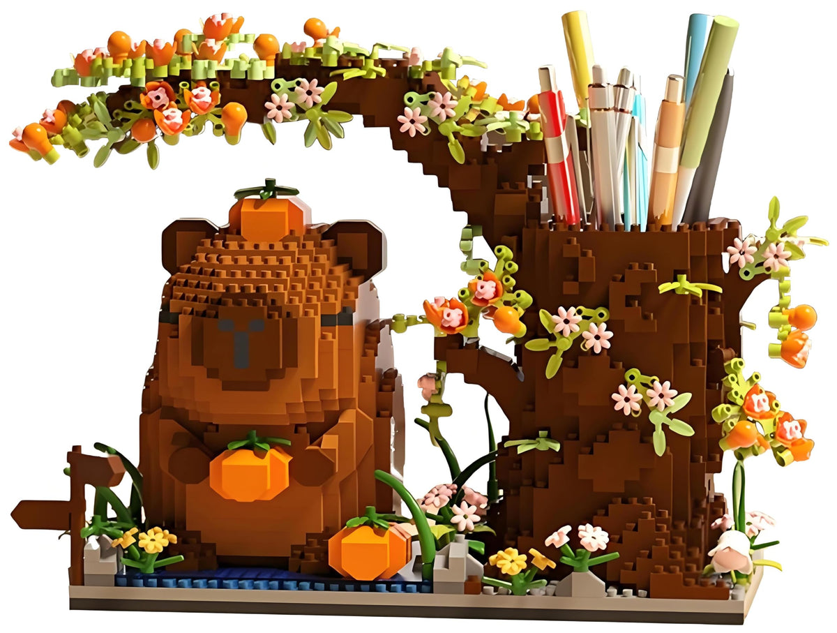 STUDYBOCKS Capybara holding pumpkin, a playful desk companion and decor boost.
