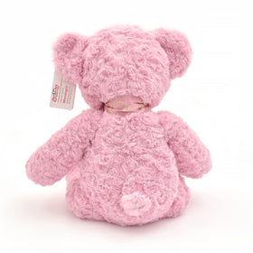 Suepcuddly teddy bear is a comforting bedtime companion.