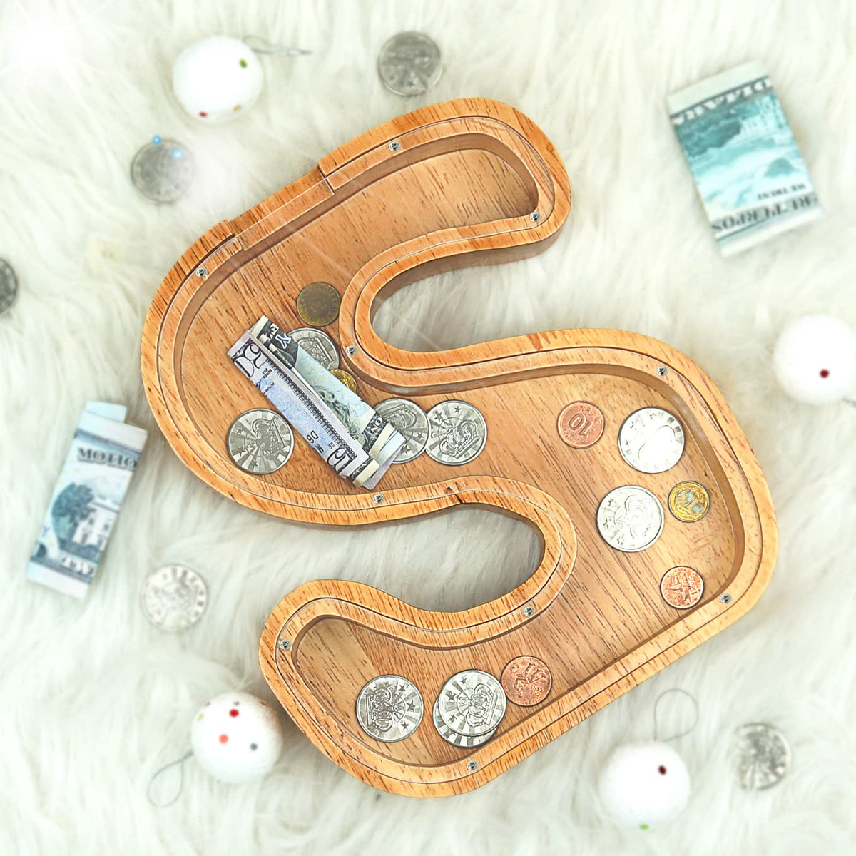 Sulevalt Piggy Bank alphabets design doubles as a learning tool.
