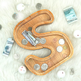 Sulevalt Piggy Bank alphabets design doubles as a learning tool.