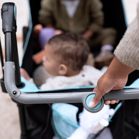 Summer Infant Pop 'N Ride features four-wheel suspension for smooth rides.
