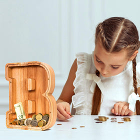 SummiDate dinosaur-shaped bank adds playful savings habit.