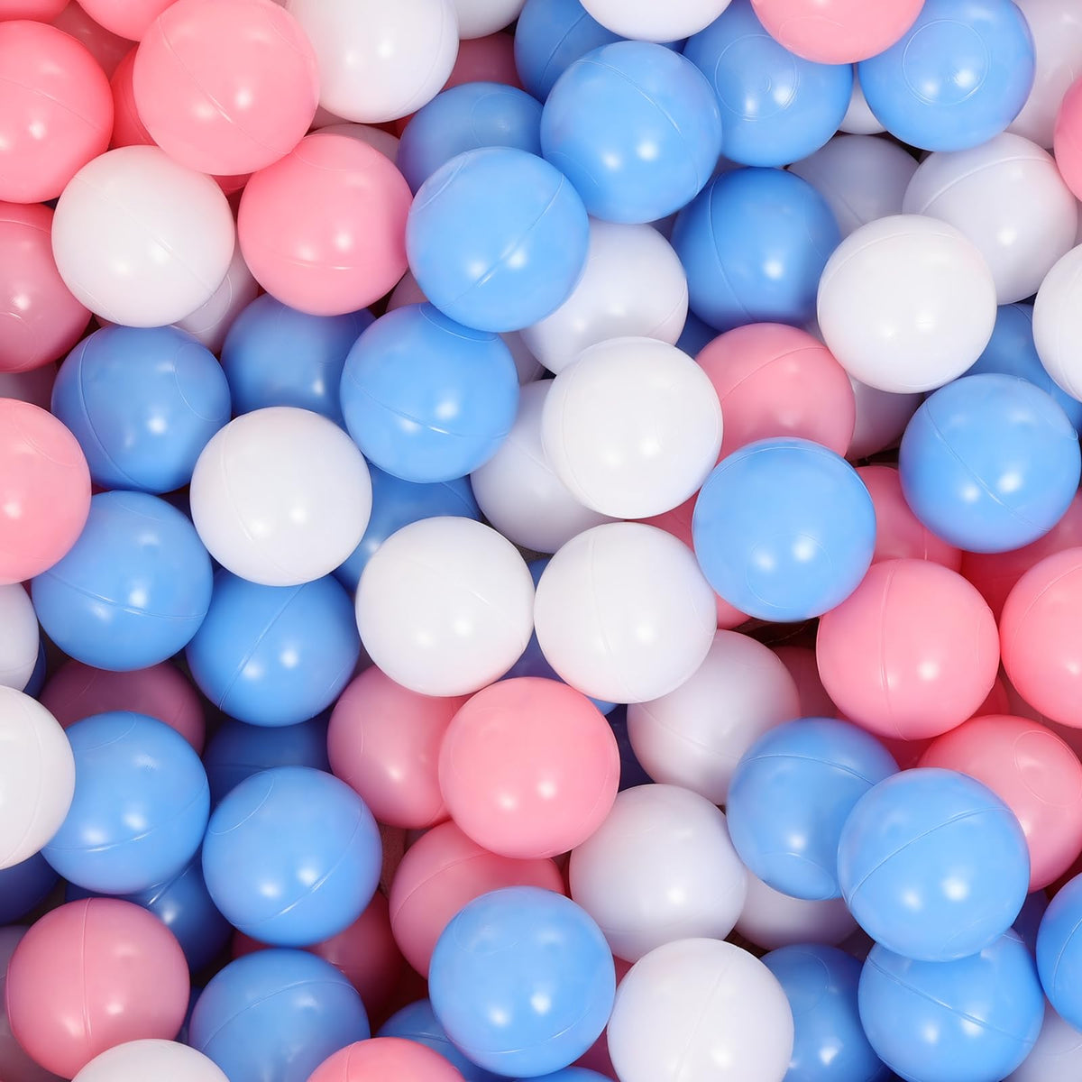 Suncuber ball pit balls in pink, white, and blue for bright, inviting play.