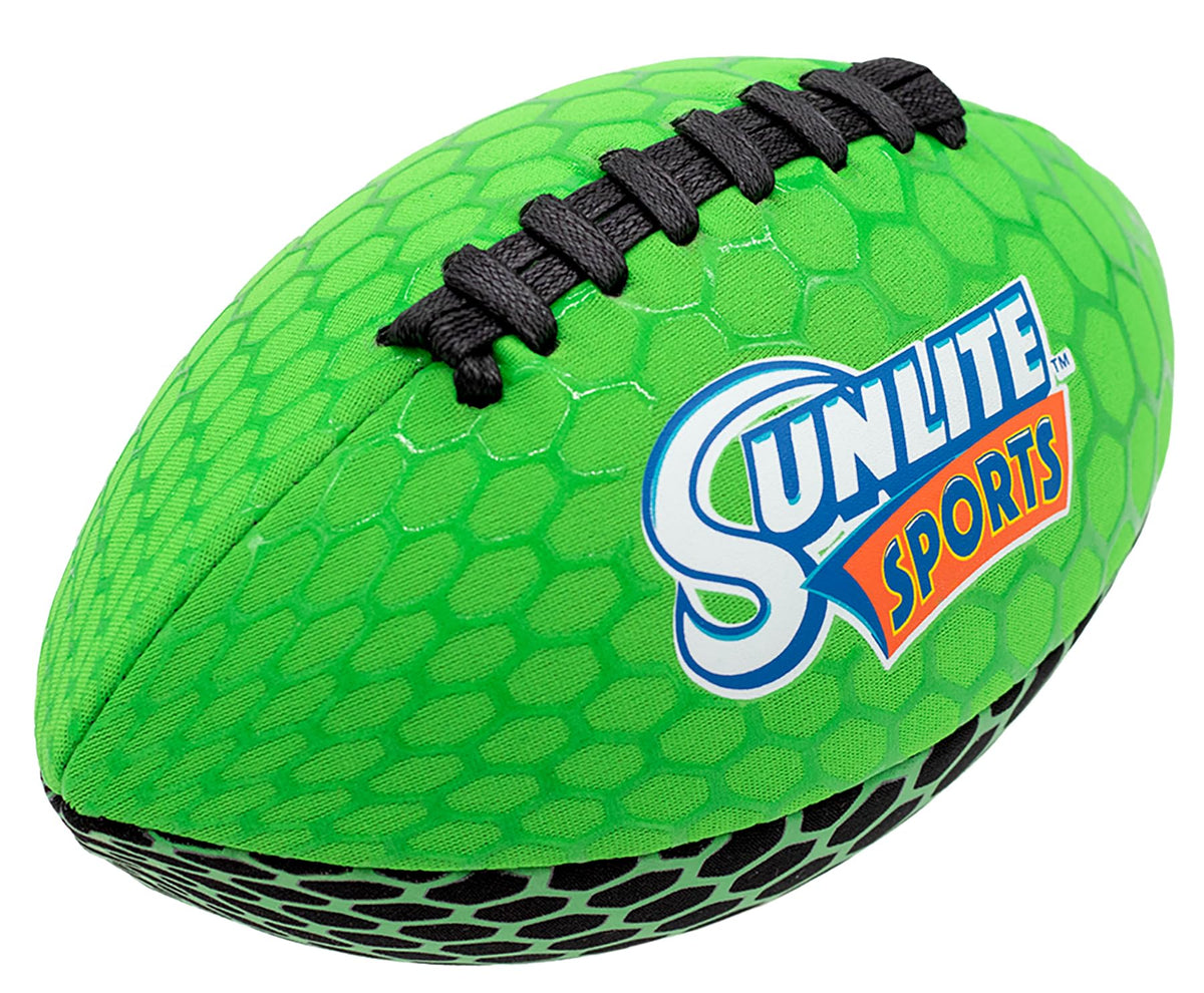 Sunlite Sports glow-dark football glowing after UV charge for nighttime play