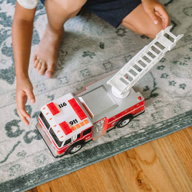 Sunny Days Maxx Action fire truck motorized drive speeds to the scene