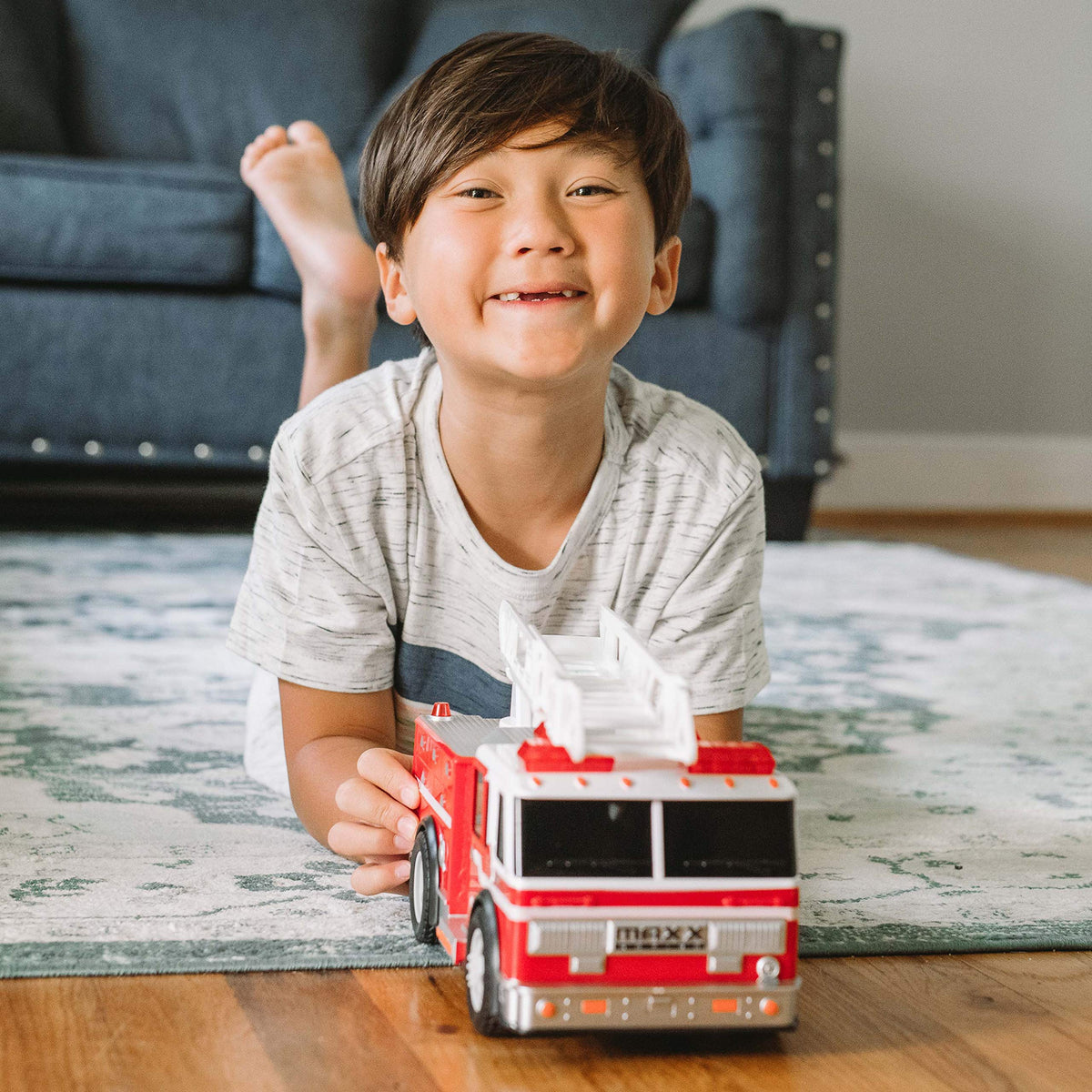 Sunny Days Maxx Action fire truck soft grip tires roll smoothly during play