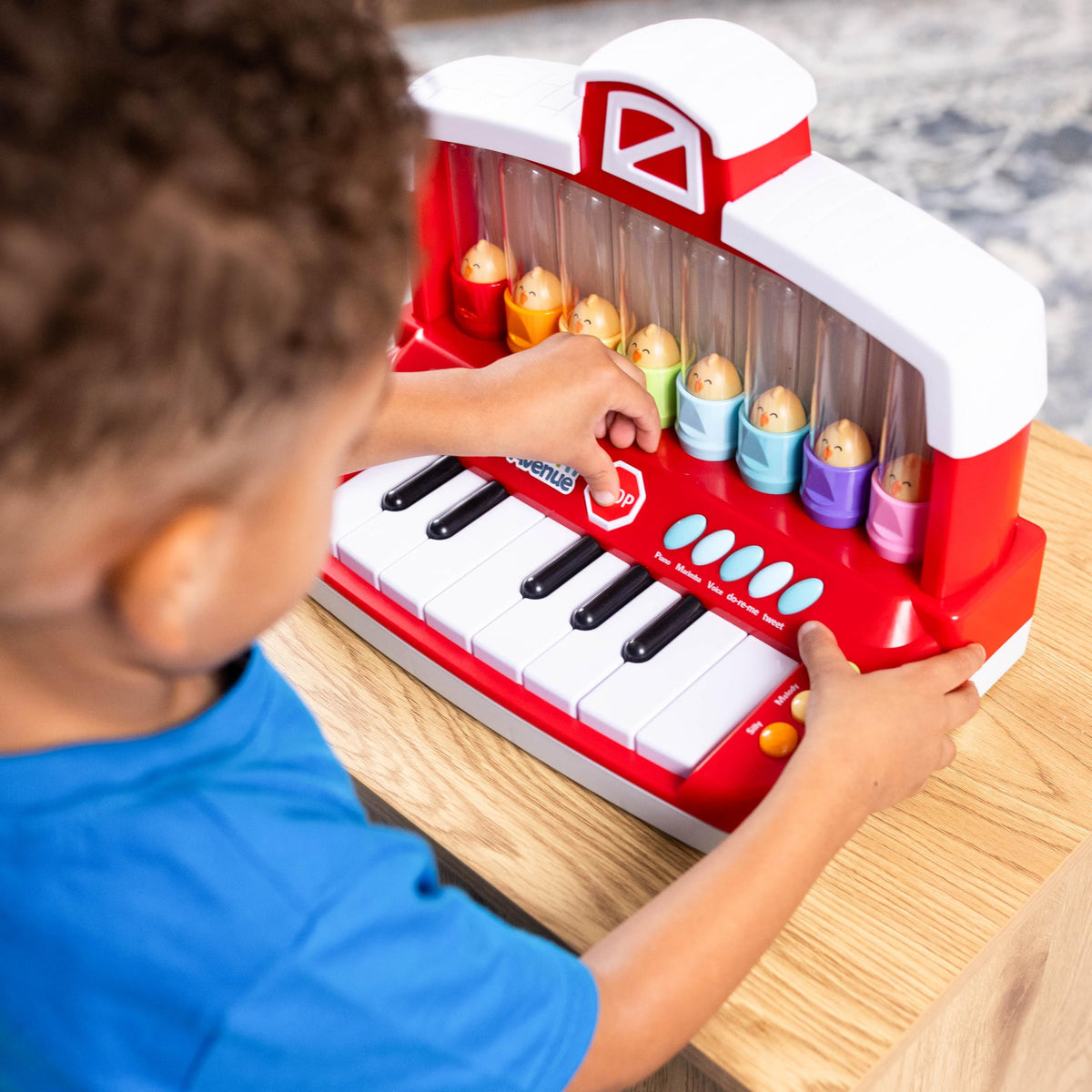 Sunny Days light-up learning songs illuminate the screen as kids practice melodies.
