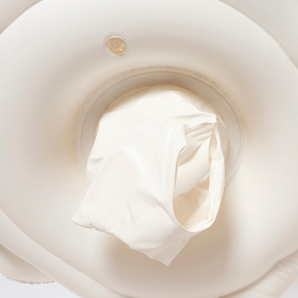 Sunnylife baby floaties' face-to-face design keeps caregiver and baby close for supervision.