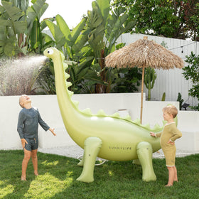 Sunnylife dinosaur sprinkler mouth spray creates a refreshing water arc