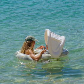 Sunnylife Float Together Baby Seat inflated at 43×29×26 inches for buoyant support.