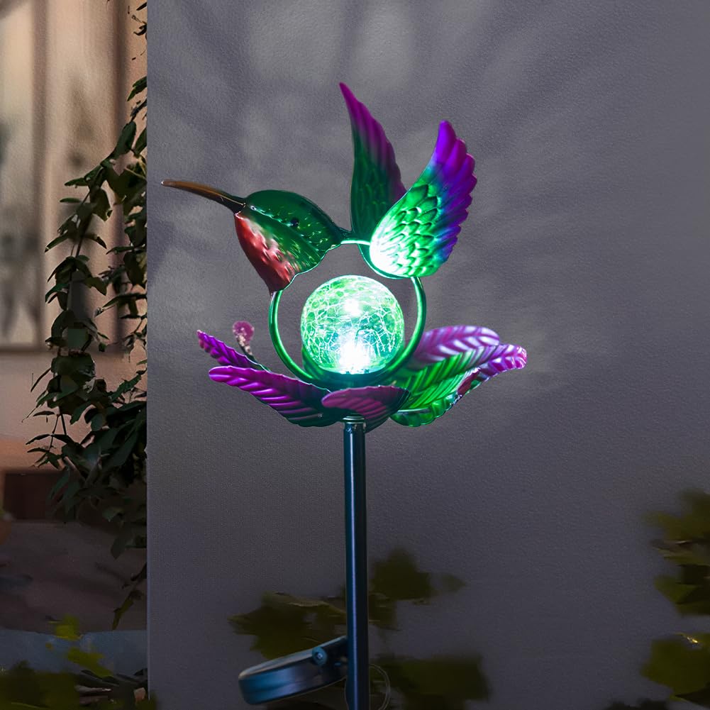 Sunnylight solar wind spinner with green hummingbird and globe for tranquil garden ambience