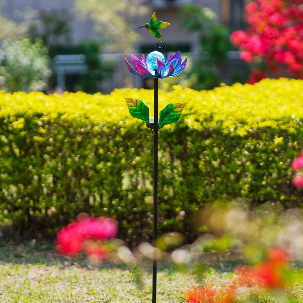 Sunnylight night-glow from the glass ball enhances evening yard ambiance.