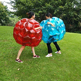 Sunshinemall bumper balls in action on grass showing outdoor fun