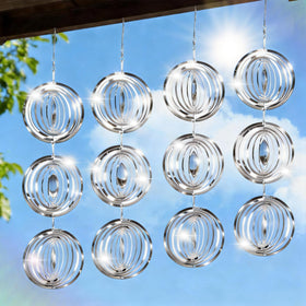 Superlong 3D wind spinner disc reflects sunlight to deter birds from patio.