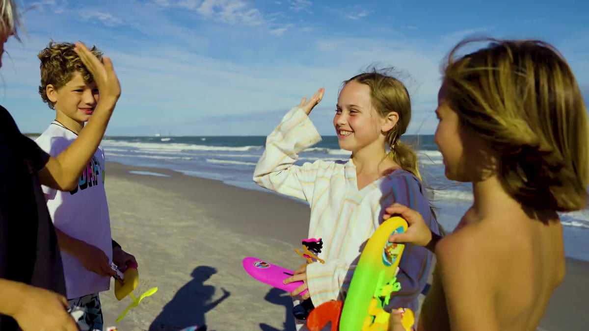 Surfer Dudes assembly kit demonstrates quick setup for ages 6 and up.