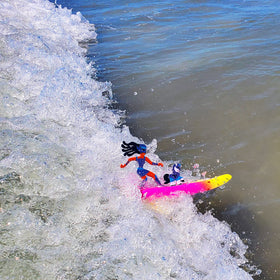 Unsinkable Surfer Dudes surfboard with wing and skeg for durable beach fun