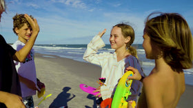 Surfer Dudes Unsinkable Surfboard floats for easy beach fun.