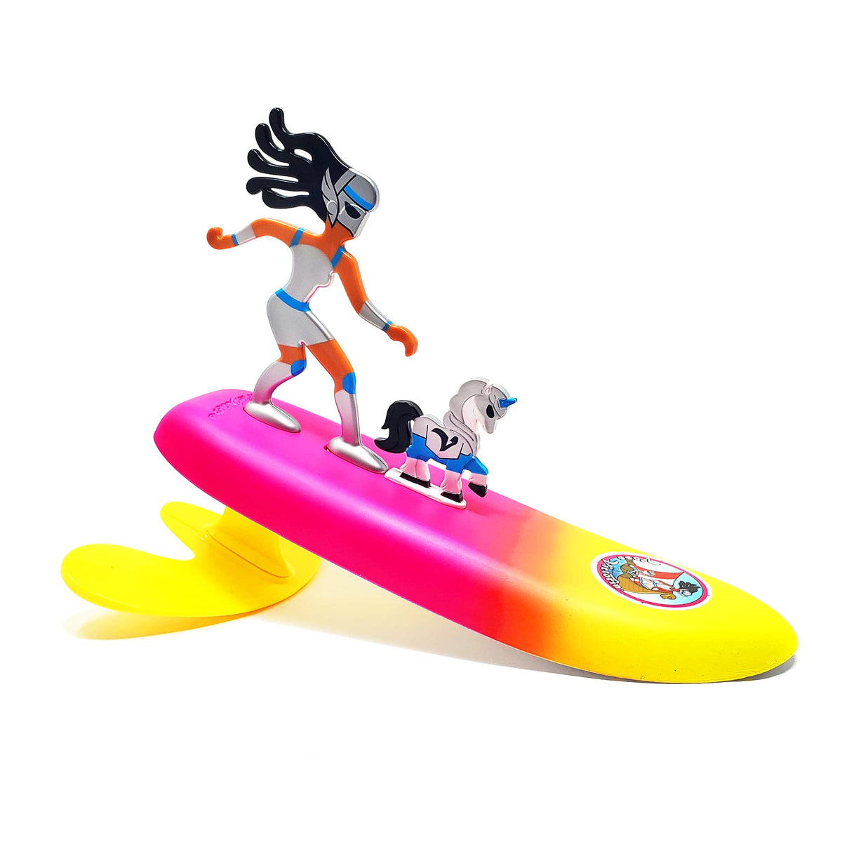 Surfer Dudes wave powered mini surfer riding a wave on the beach