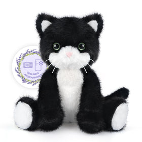 SuzziPals black and white cat plush emits warm cuddle vibes for cozy moments
